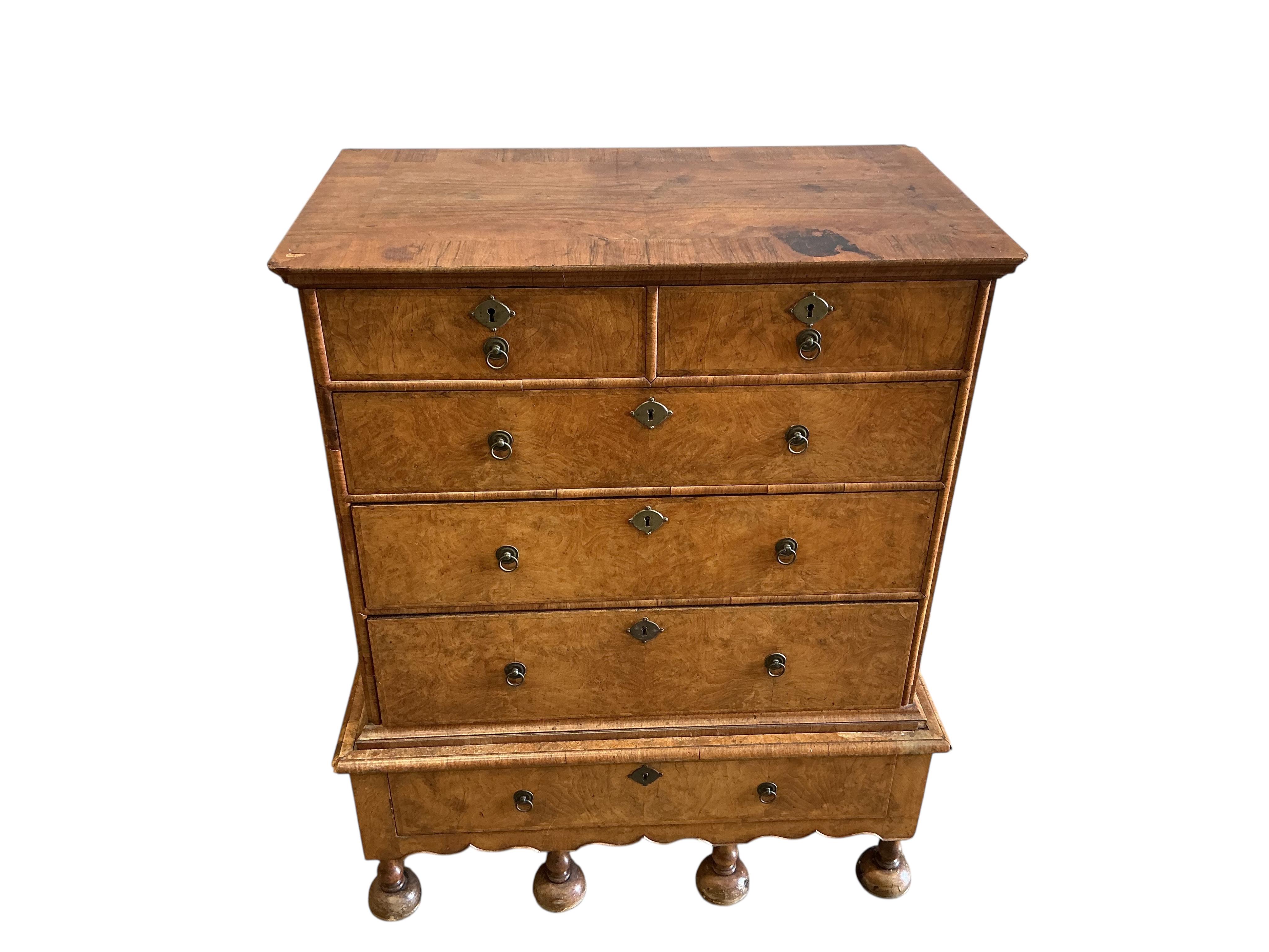 An 18th century style walnut chest on stand, width 108cm, depth 62cm, height 132cm